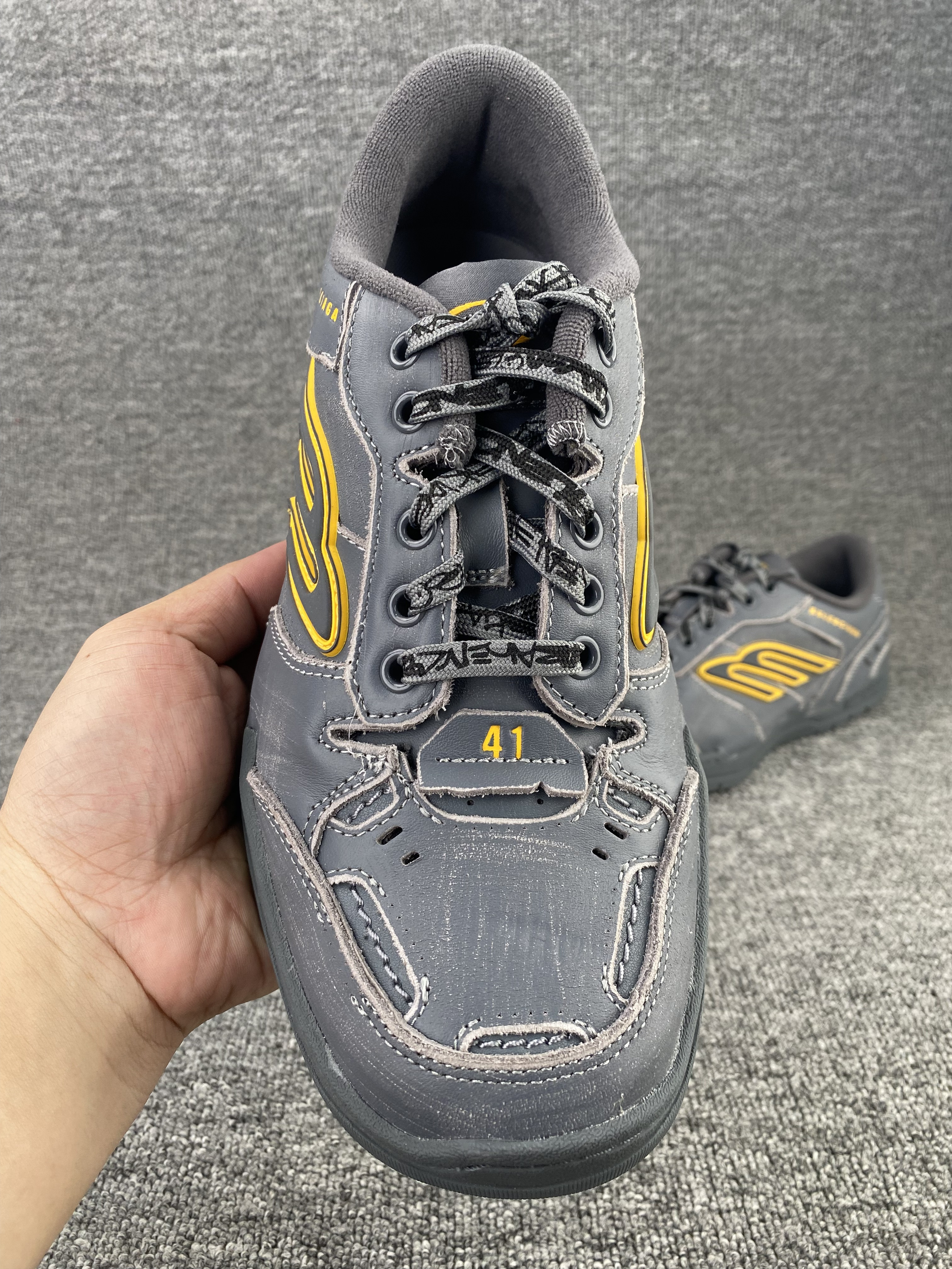 ua Ba*len*cia*ga hamptons worn-out sneaker in grey/yellow(run one size large)