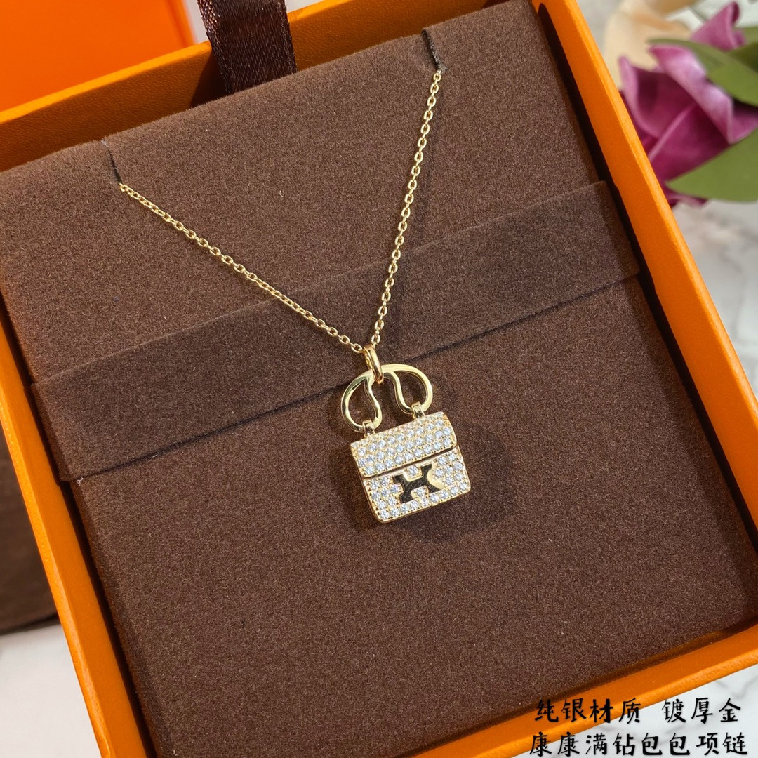 H**me5 fully di*m*nd-encrusted h bag necklace