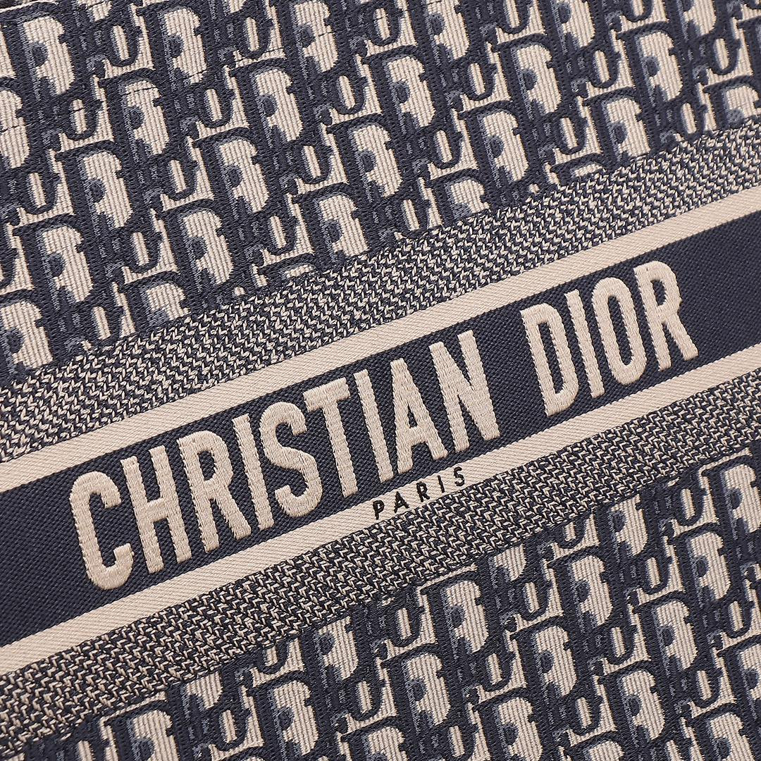 medium D*or book tote  ecru and blue D*or oblique embroidery 14 x 11 x 6.5 inches